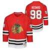 Connor Bedard Chicago Blackhawks Youth Home Centennial Premier Jersey - Red - Front View